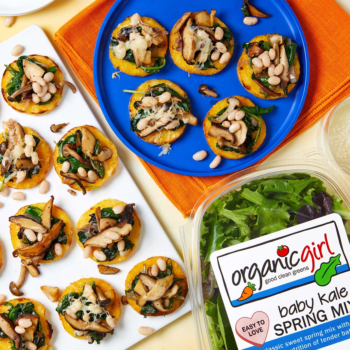 polenta bites with wild mushrooms and baby kale